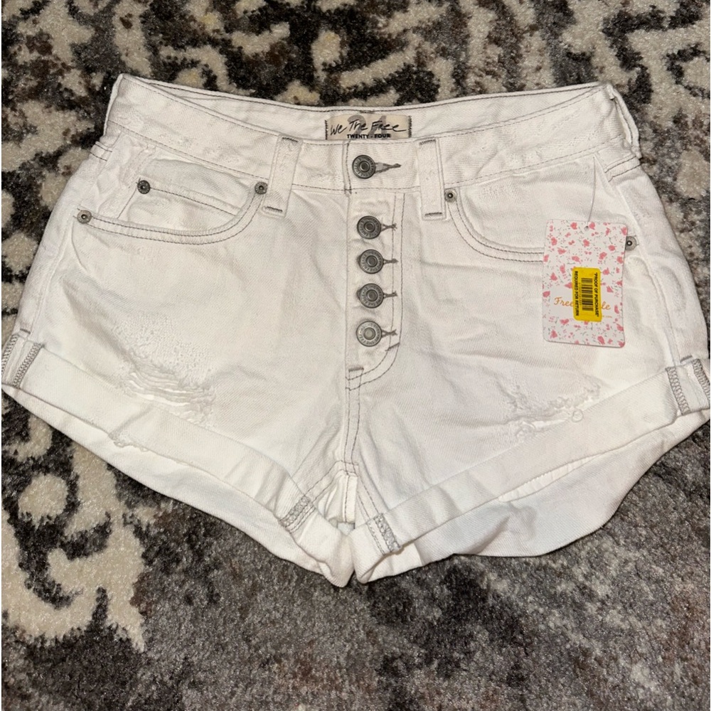 Free people distressed white shorts